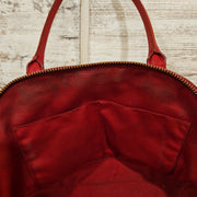 RED PURSE $275