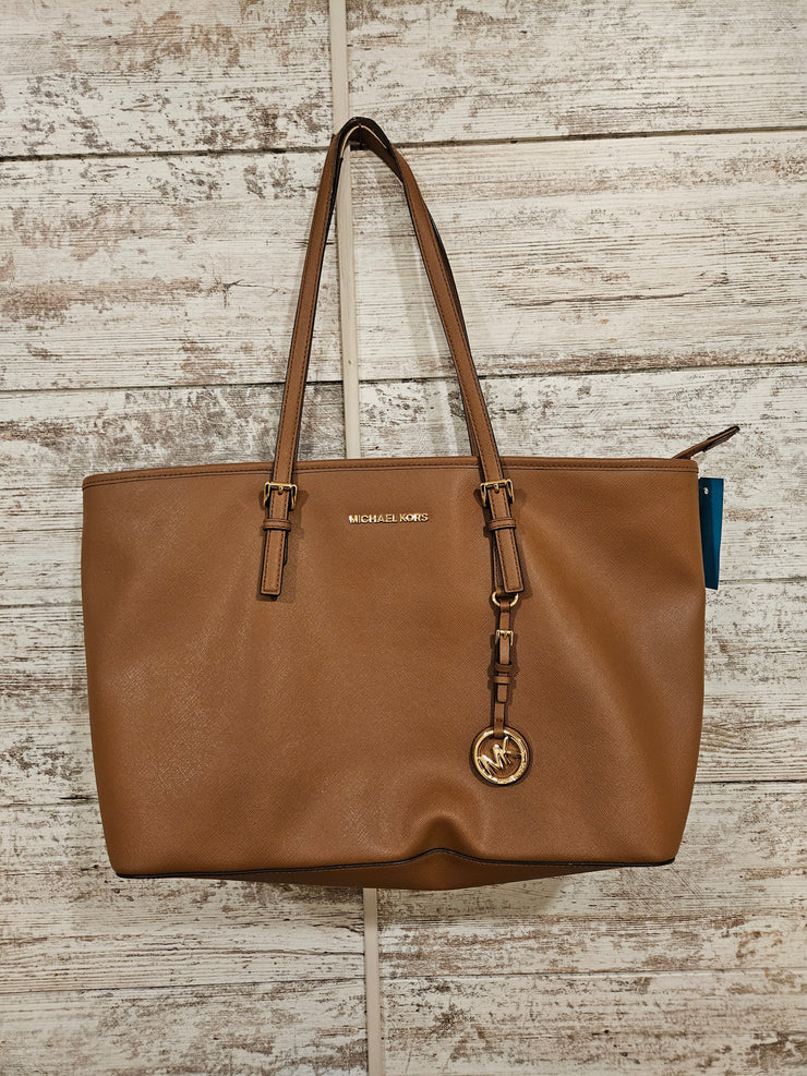 TAN PURSE - RETAIL $298