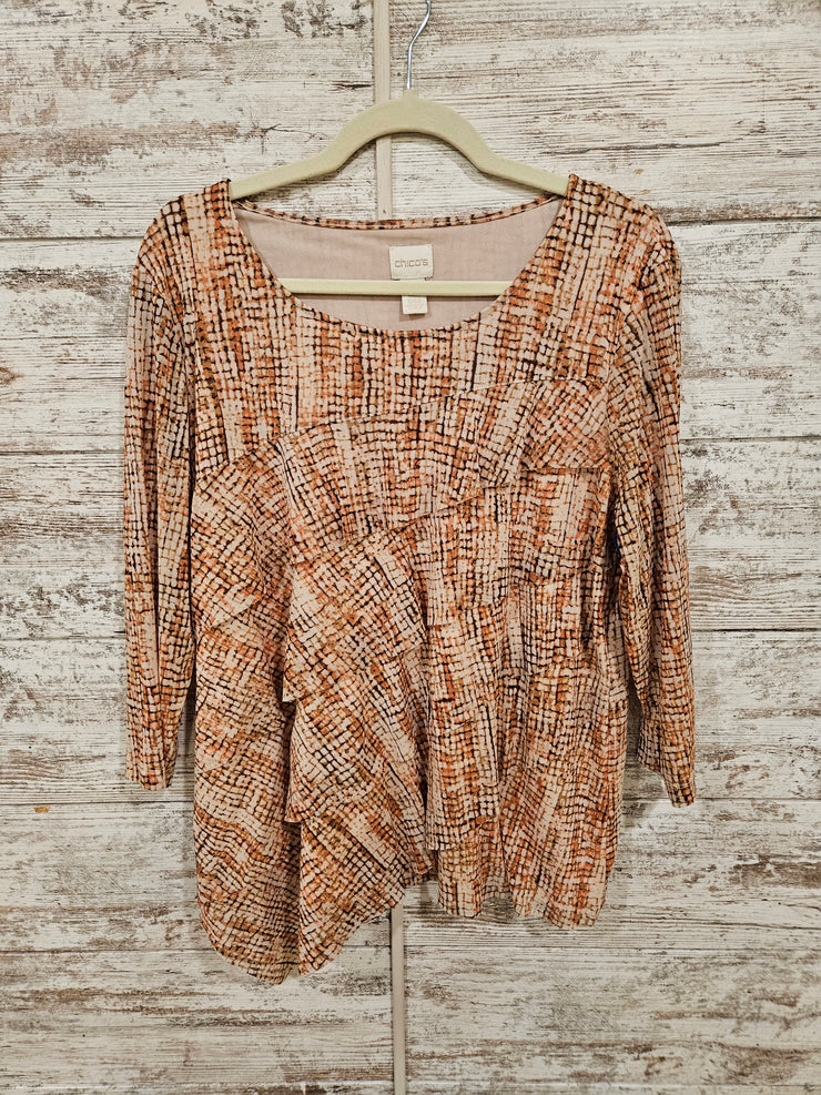 TAN/ORANGE RUFFLED TOP $69