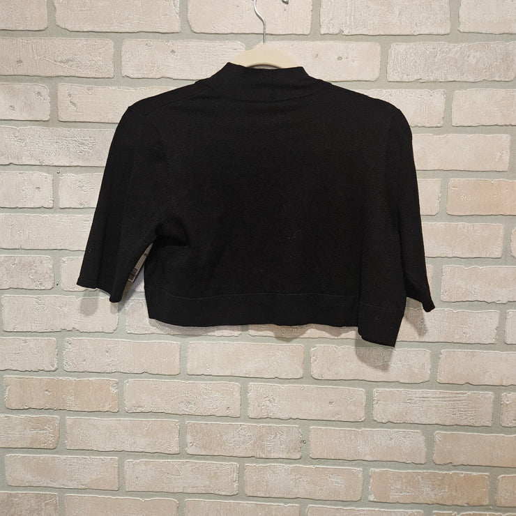 BLACK OPEN SHRUG $69