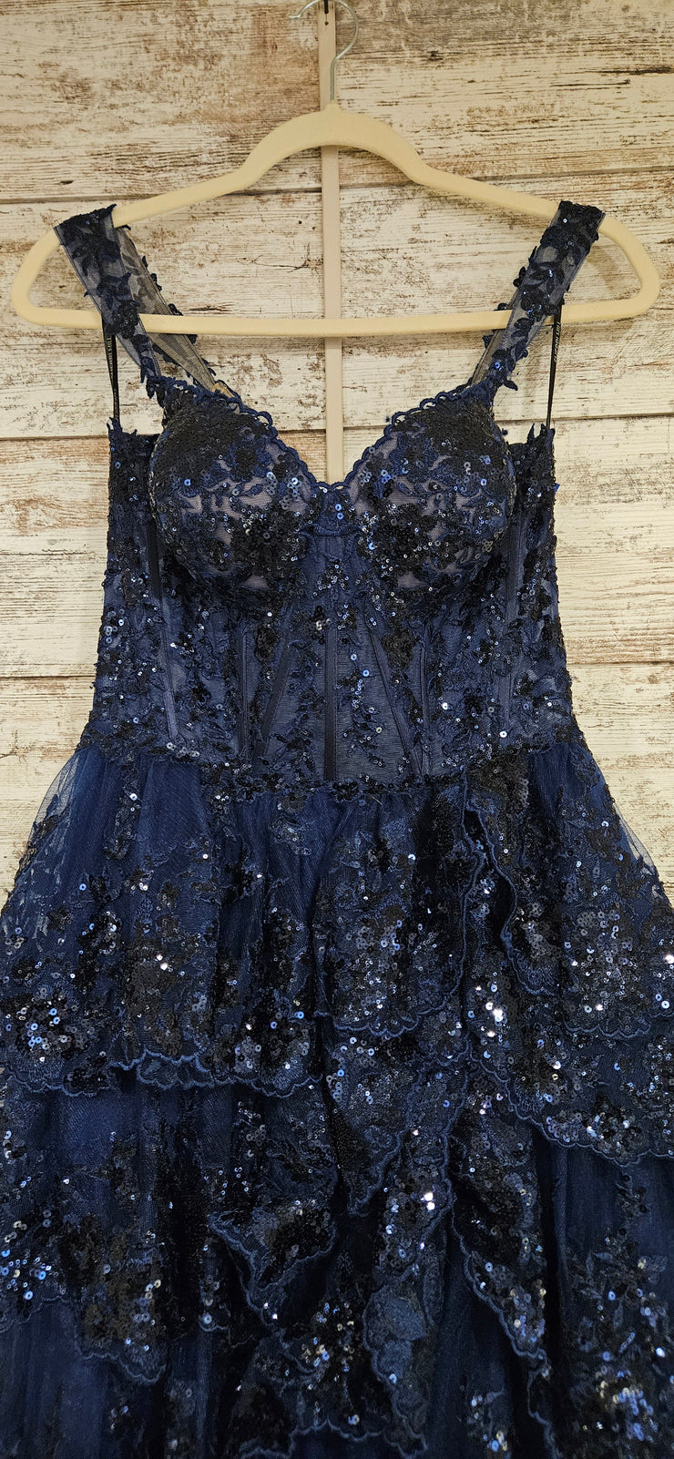 NAVY TIERED A LINE GOWN $950