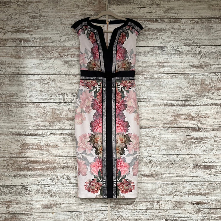 BLACK/FLORAL MIDI DRESS $295