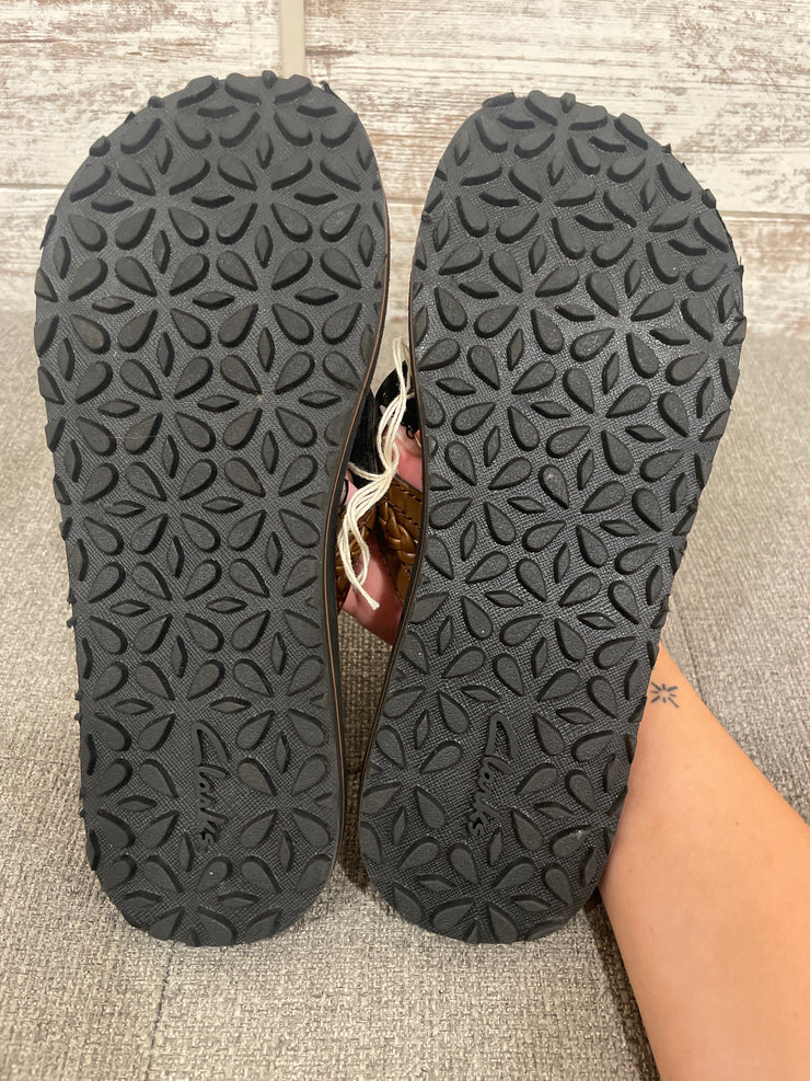 BROWN FLIP FLOPS $95