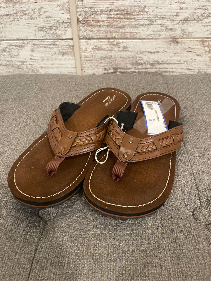 BROWN FLIP FLOPS $95