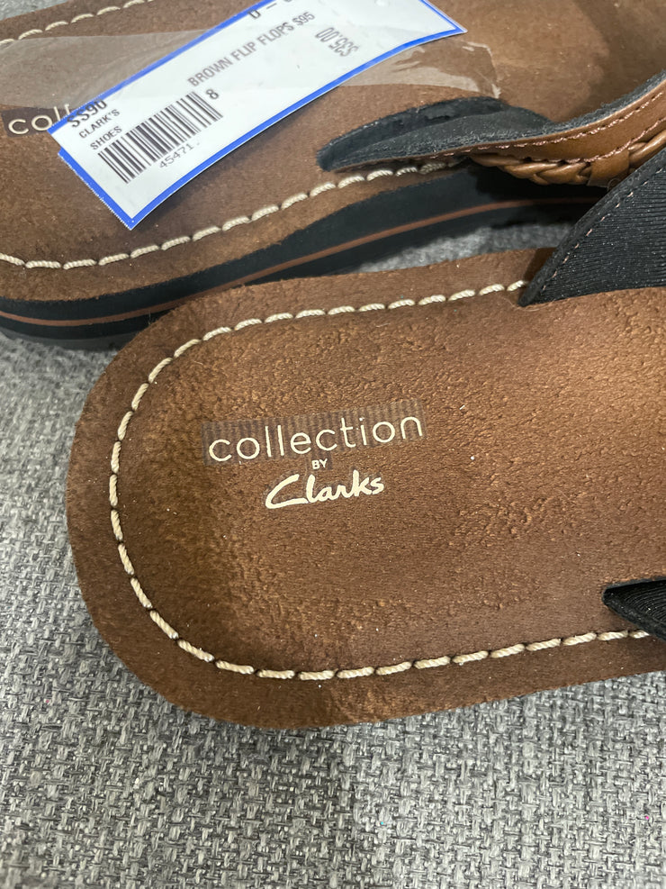 BROWN FLIP FLOPS $95