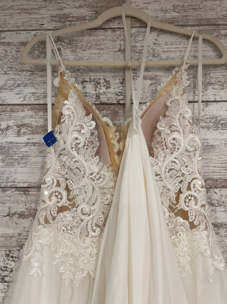 IVORY/NUDE WEDDING GOWN $1400