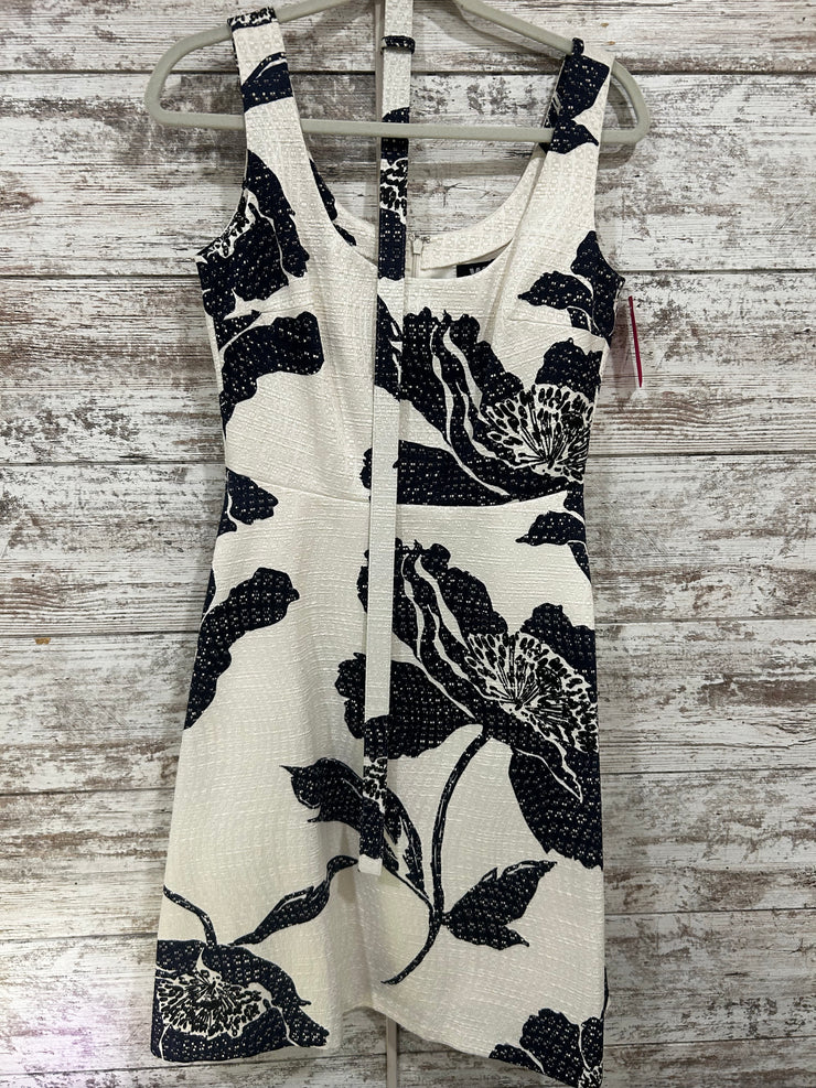 WHITE/NAVY FLORAL DRESS $300