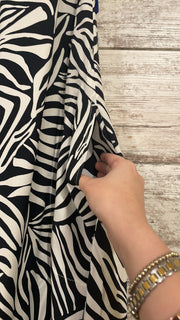 BLACK/WHITE ZEBRA JUMPSUIT $89