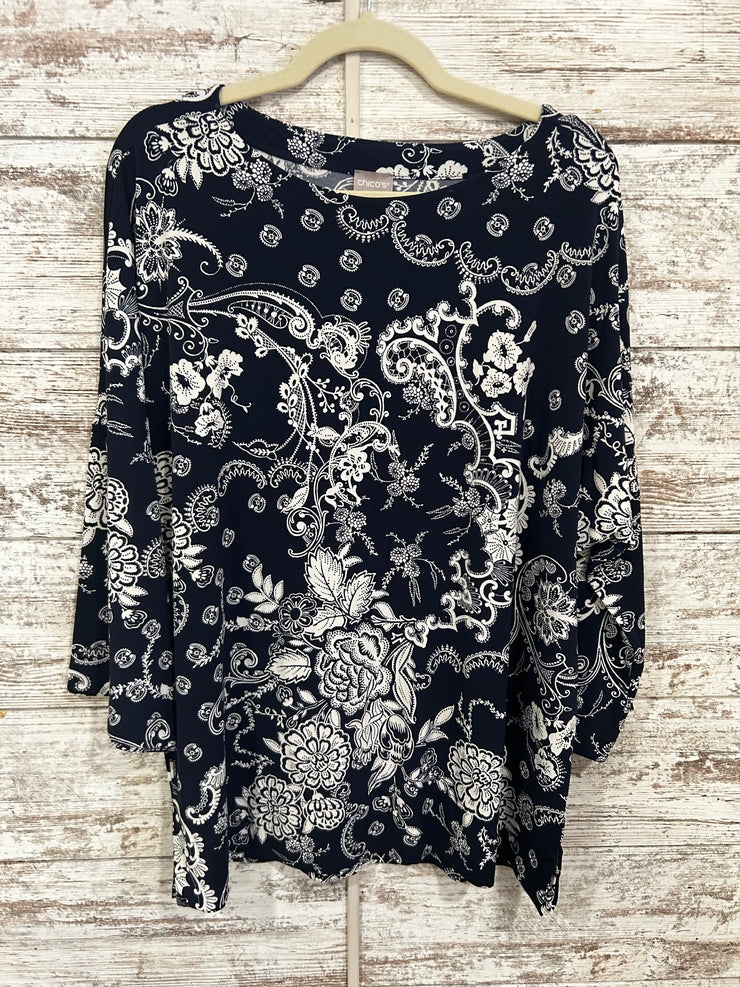 NAVY/WHITE FLORAL TOP $129