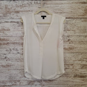 WHITE SLEEVELESS TOP
