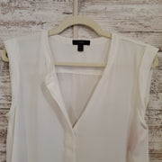 WHITE SLEEVELESS TOP