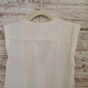 WHITE SLEEVELESS TOP