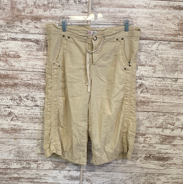 TAN BERMUDA SHORTS $86