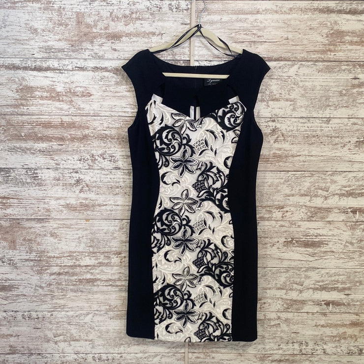 BLACK/WHITE SHORT DRESS$350